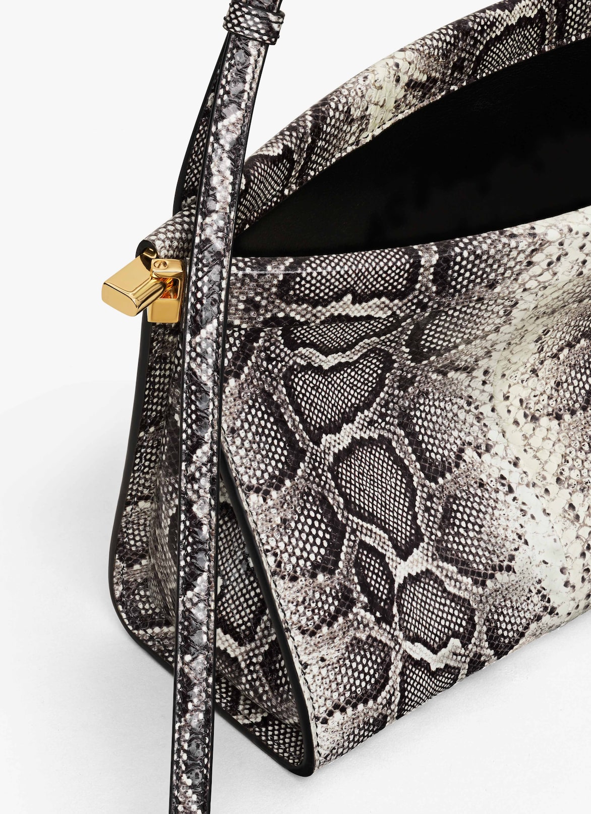 LE CLICK EAST WEST MEDIUM BAG IN AYERS LEATHER ALAÏA WHITE/BLACK LE CLICK EAST WEST MEDIUM BAG IN AYERS LEATHER